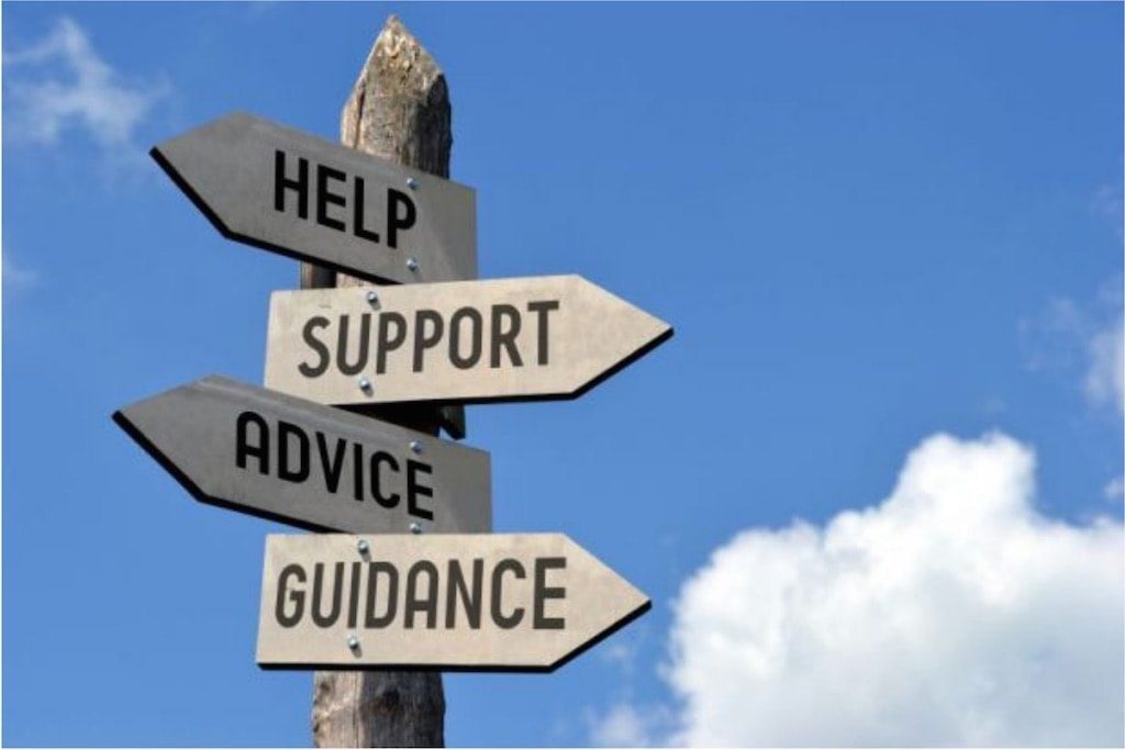 a sign with the words "Help, Support, Advice and Guidance" all what a small business would need