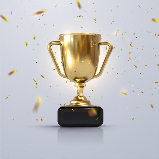 A golden trophy on a white background with confetti, to be given to winner of the best personal finance blogs!