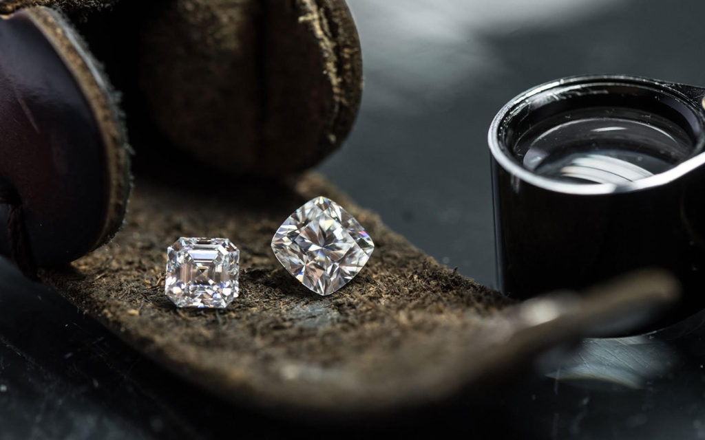 Invest in diamonds: two cut diamonds being readied for inspection