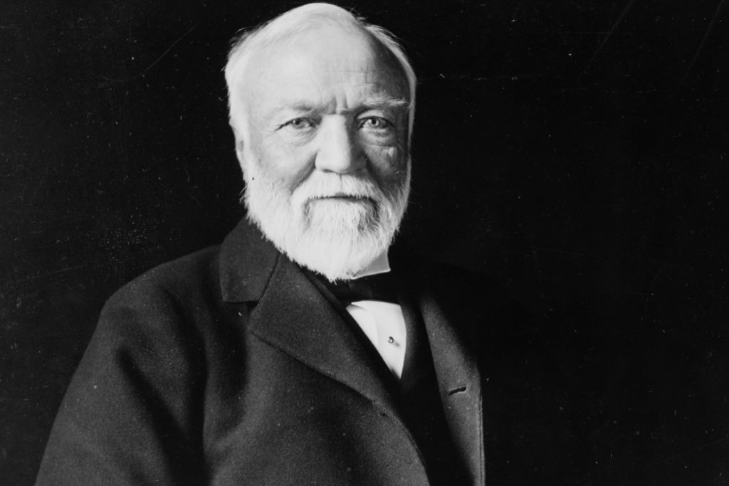 Richest people to have ever lived: An old photograph of Andrew Carnegie sat down, starring into the camera 