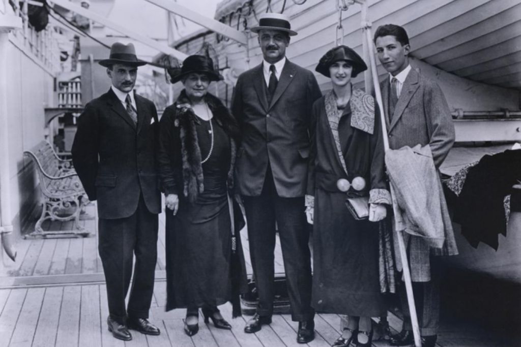 A black and white photo of Amadeo Gianni (center) with his family on board an oceanliner